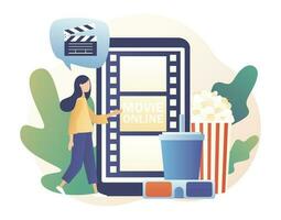 Online cinema concept. Mobile movie theater. Tiny woman watching movie at mobile app with popcorn, 3d glasses and video attributes. Modern flat cartoon style. Vector illustration on white background