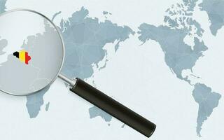 Asia centered world map with magnified glass on Belgium. Focus on map of Belgium on Pacific-centric World Map. vector