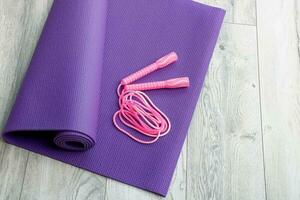 jump rope on a purple gymnastic mat photo