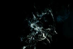 Smoke effect texture. Isolated background. Black and dark backdrop. Smokey fire and mistic effect. photo