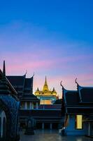 Beautiful sunset at Golden mountain phu khao thong an ancient pagoda at Wat Saket temple on January 29, 2023. The famous destination in Bangkok, Thailand. photo