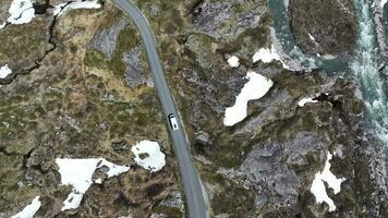Motorhome Driving Along Winding Road in Norwegian Mountains video