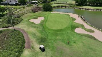 Golfers Play On The Course On A Sunny Day, Mauritius, Aerial View video