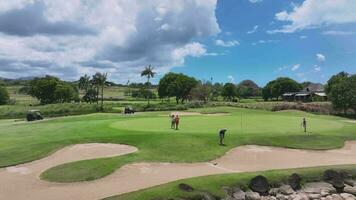 Golfers Play On The Course On A Sunny Day, Mauritius, Aerial View video