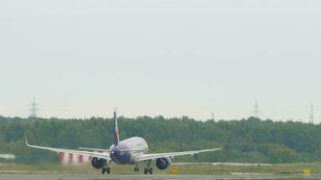 NOVOSIBIRSK, RUSSIAN FEDERATION JULY 15, 2022 - Airbus A320 of Smartavia takeoff at Tolmachevo Airport, Novosibirsk. Airplane departure, rear video