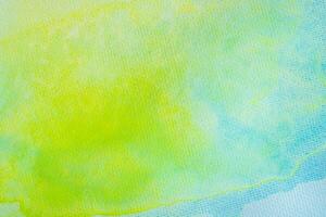 Gradient blue yellow and green watercolor background. Abstract watercolor art of paint on white paper. photo