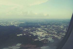 interesting views from the airplane window on a warm summer day photo