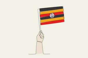 A hand raised the Uganda flag vector