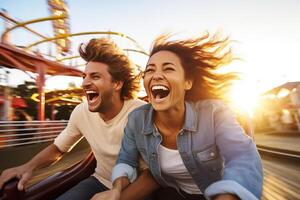 Excited couple enjoying a thrilling, high-speed ride at an amusement park. photo