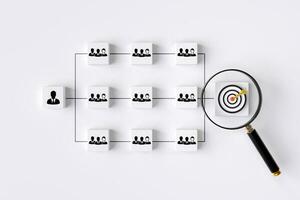 Human icon on square cube and contour diagram with target magnifying glass. concept of teamwork the organizational structure planning process for success. photo