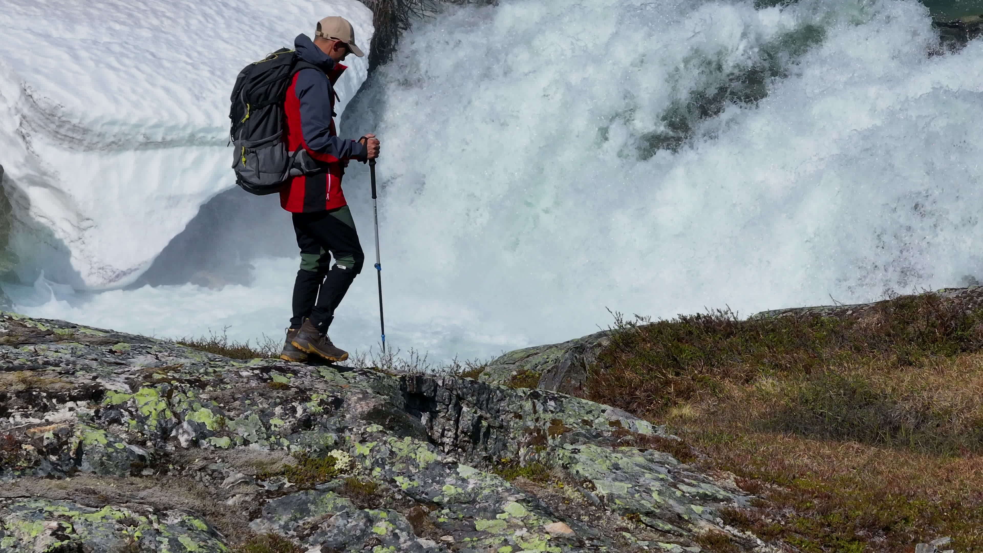 Experienced Hiker Walking by Waterfall on Mountain Trail 25463403 Stock
