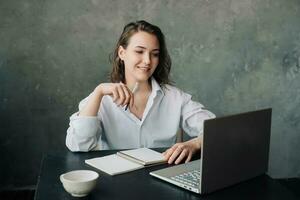 Digital Teaching. Elegant Businesswoman or Teacher Engaging in Video Conference from Office - Emphasizing Online Work and Remote Education Concepts photo