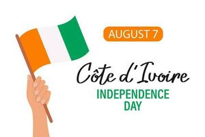 Independence Day Ivory Coast. A hand holds the flag of Ivory Coast. Illustration, banner, poster, vector