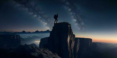 Hiker at the summit of a mountain overlooking a stunning view. AI Generated photo