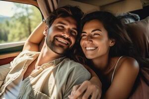 Happy young couple lying together in a van, enjoying vacation time together . AI Generated photo