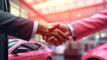 A sales representative shaking hands with an individual over a car, in the style of light crimson, poster, large canvas format, close up shots. photo