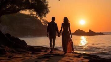 sunset beach with couple holding hands. photo