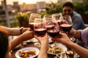 Group of young people hands toasting red wine at rooftop party. AI Generated photo