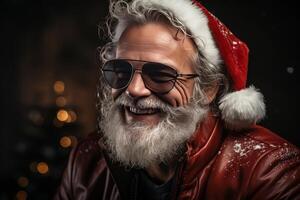 Waist up portrait of funky Santa wearing sunglasses and smiling at camera. photo