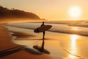 Man with surfboard on sea beach at sunset. photo