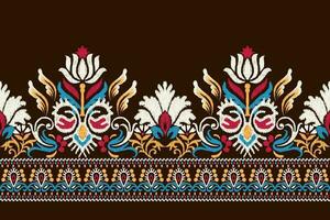 ikat floral cachemir bordado en marrón fondo.ikat étnico oriental modelo tradicional.azteca estilo resumen vector ilustración.diseño para textura,tela,ropa,envoltura,decoración,pareo,bufanda