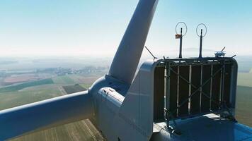 Aerial view of part of windmill turbine in countryside, Green energy photo