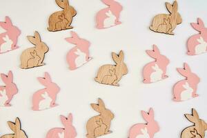 Happy Easter decoration, Wooden rabbit on white background photo