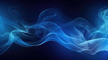 Smoke swirling effect. Ink drop in water on dark blue background. photo