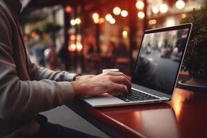 hombre trabajando en cafetería, utilizando ordenador portátil. mecanografía en teclado. generativo ai foto