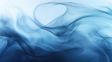 Smoke swirling effect. Ink drop in water on dark blue background. photo