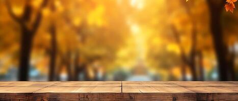 Empty Wooden table in garden of fall time. photo