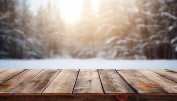 Empty Wooden table in front of winter landscape blurred background. photo