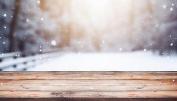 Empty Wooden table in front of winter landscape blurred background. photo