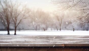 Empty Wooden table in front of winter landscape blurred background. photo