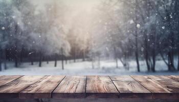 Empty Wooden table in front of winter landscape blurred background. photo