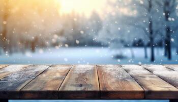 Empty Wooden table in front of winter landscape blurred background. photo