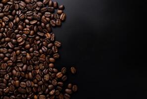 Fresh Coffee Beans On Dark Background with empty space for text. photo