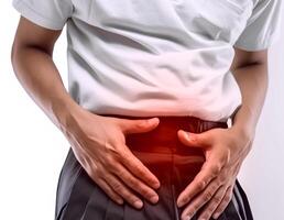 Man suffering lower abdominal pain. photo