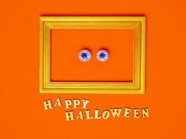 Scary and funny eyes in a frame, happy Halloween inscription on an orange background, copy space, Flat layout, top view photo