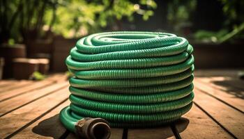 Fresh green garden hose, tied up outdoors generated by AI photo