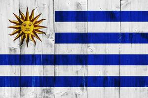 Flag of Eastern Republic of Uruguay on a textured background. Concept collage. photo