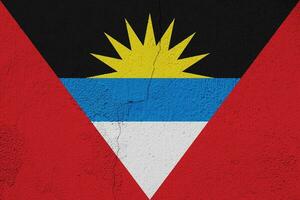 Flag of Antigua and Barbuda on a textured background. Concept collage. photo