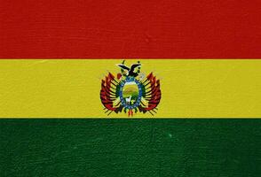 Flag of Bolivia on a textured background. Concept collage. photo