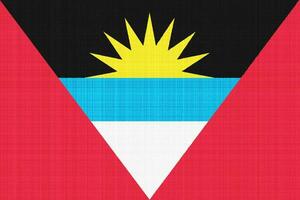 Flag of Antigua and Barbuda on a textured background. Concept collage. photo