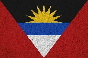 Flag of Antigua and Barbuda on a textured background. Concept collage. photo