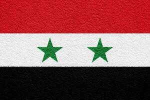 bandera de sirio árabe república en un texturizado antecedentes. concepto collage. foto