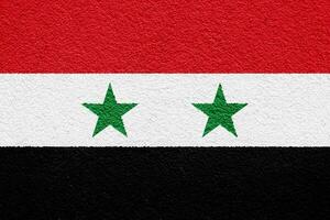 Flag of Syrian Arab Republic on a textured background. Concept collage. photo