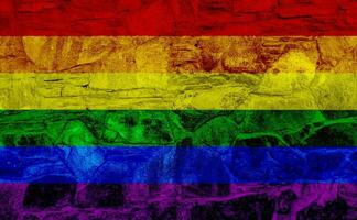 Flag of the LGBT community on the background of a stone wall. Rainbow symbol of gay culture. Concept collage. Illustration symbol of pride. photo