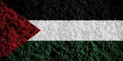 Flag of State of Palestine on a textured background. Concept collage. photo