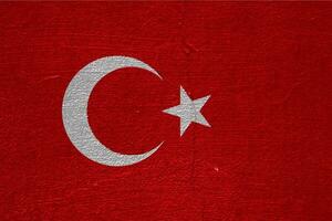 bandera de Turquía en un texturizado antecedentes. concepto collage. foto